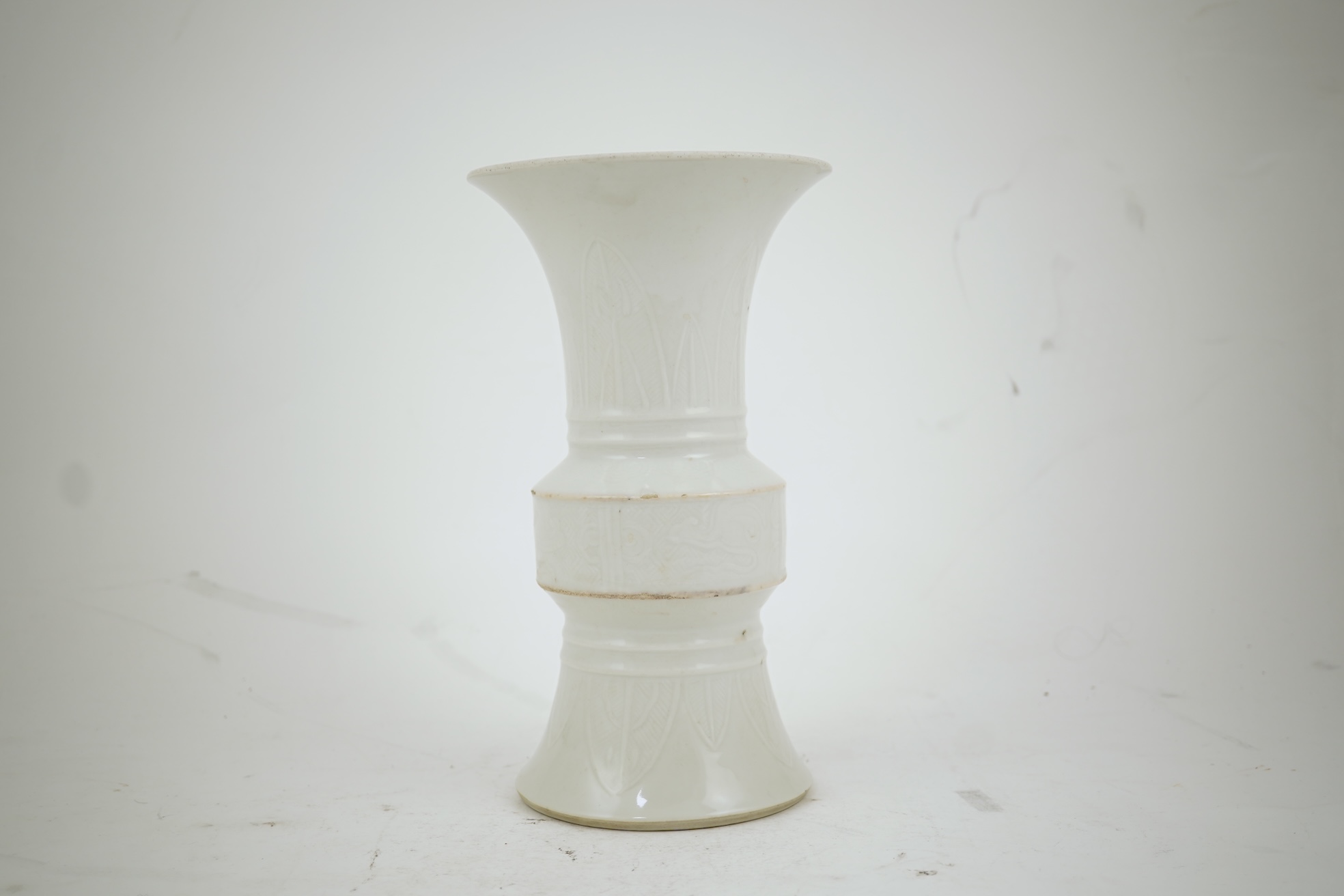 A Chinese white glazed 'gu' vase, 19th century